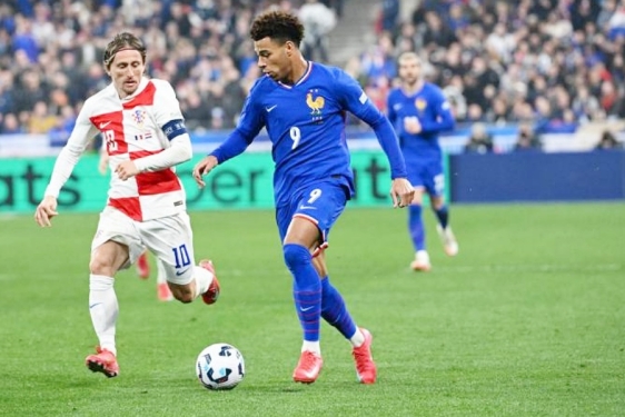 Luka Modrić i Désiré Doué