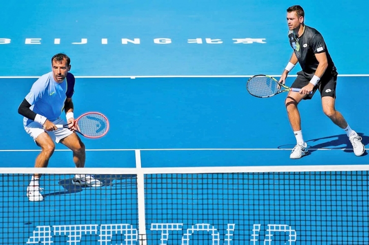 Ivan Dodig i Austin Krajicek u Pekingu ušli u sedmo finale ove sezone